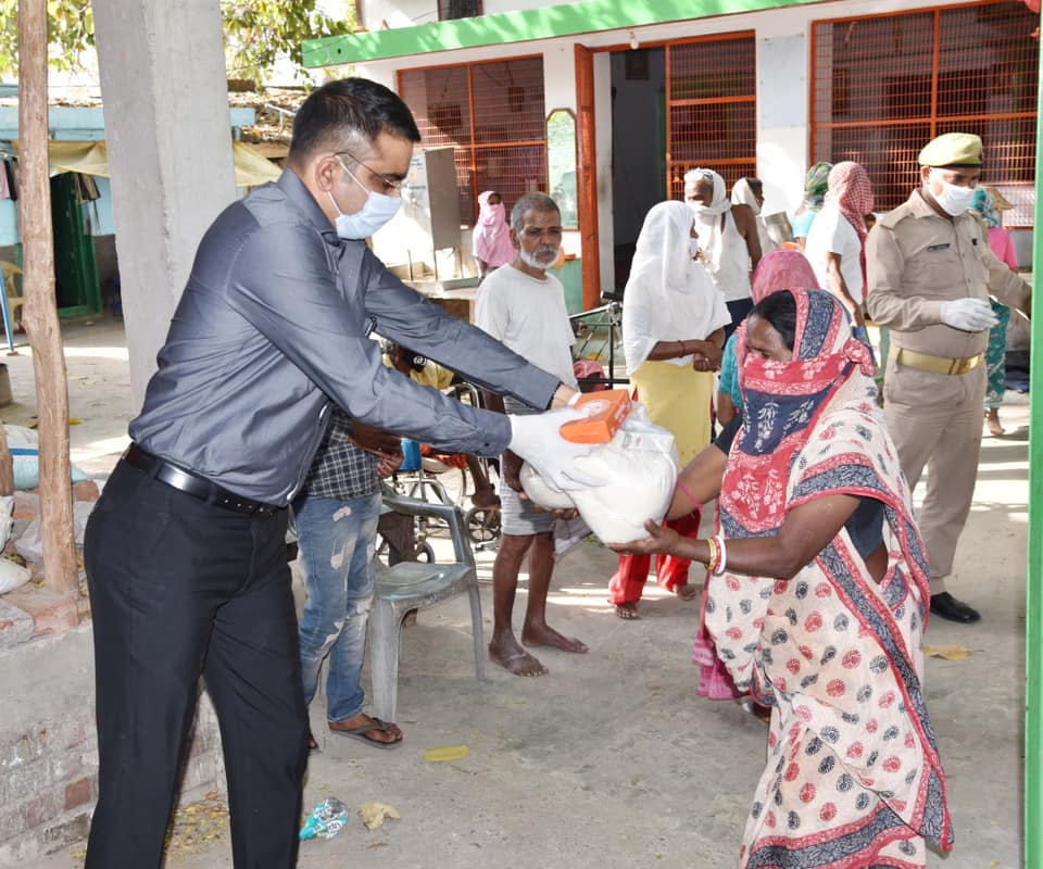 Distributed food packets to the needy at Shri Kashi Vishwanath Kushth Ashram